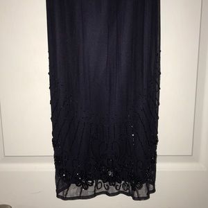 Dark blue dress with embroidery